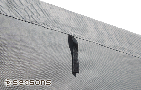 Velcro strap sewn into the seam that can be used to securely store your cover panels when rolled up